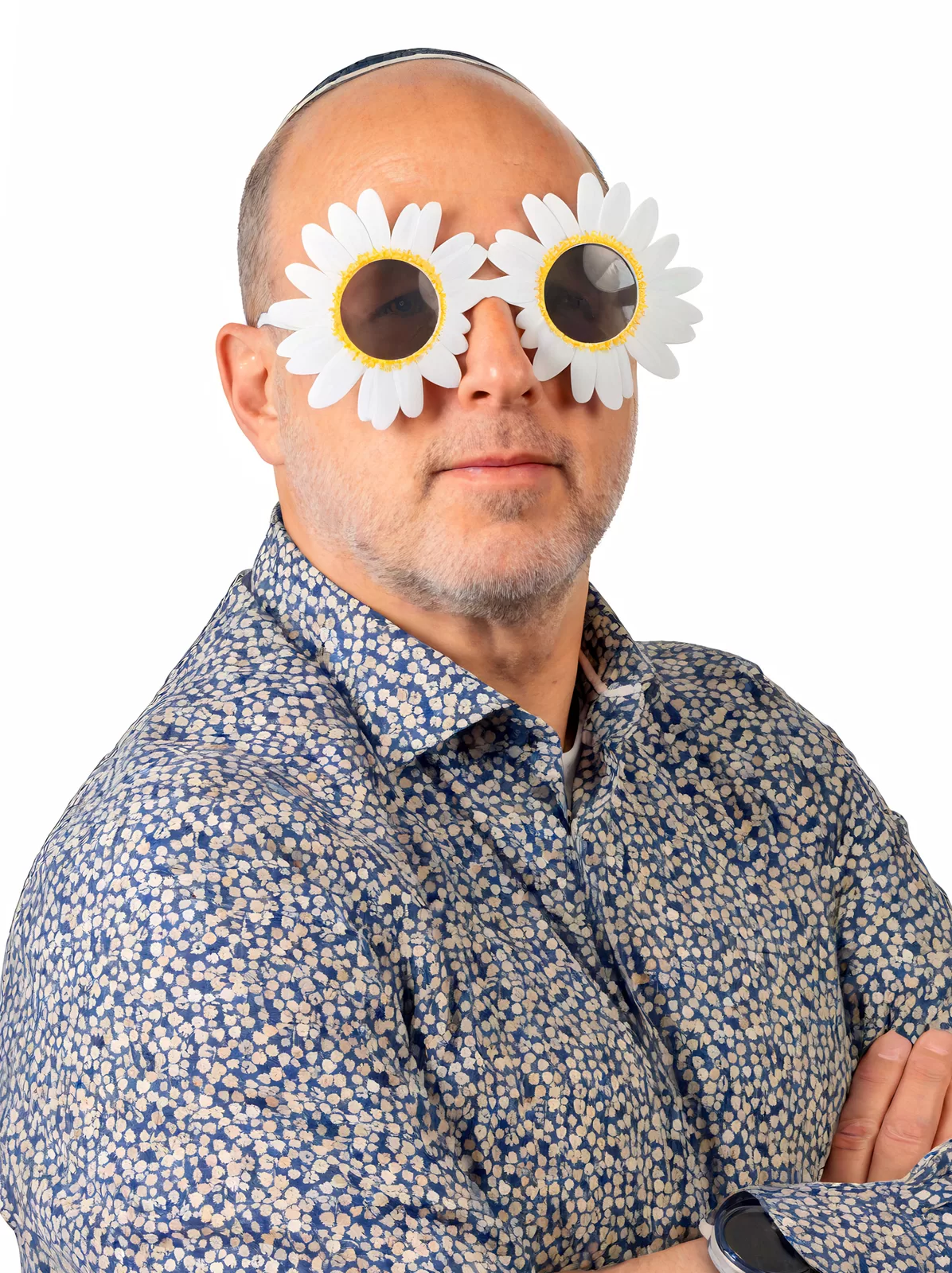 Creative male studio headshot with flower-shaped sunglasses