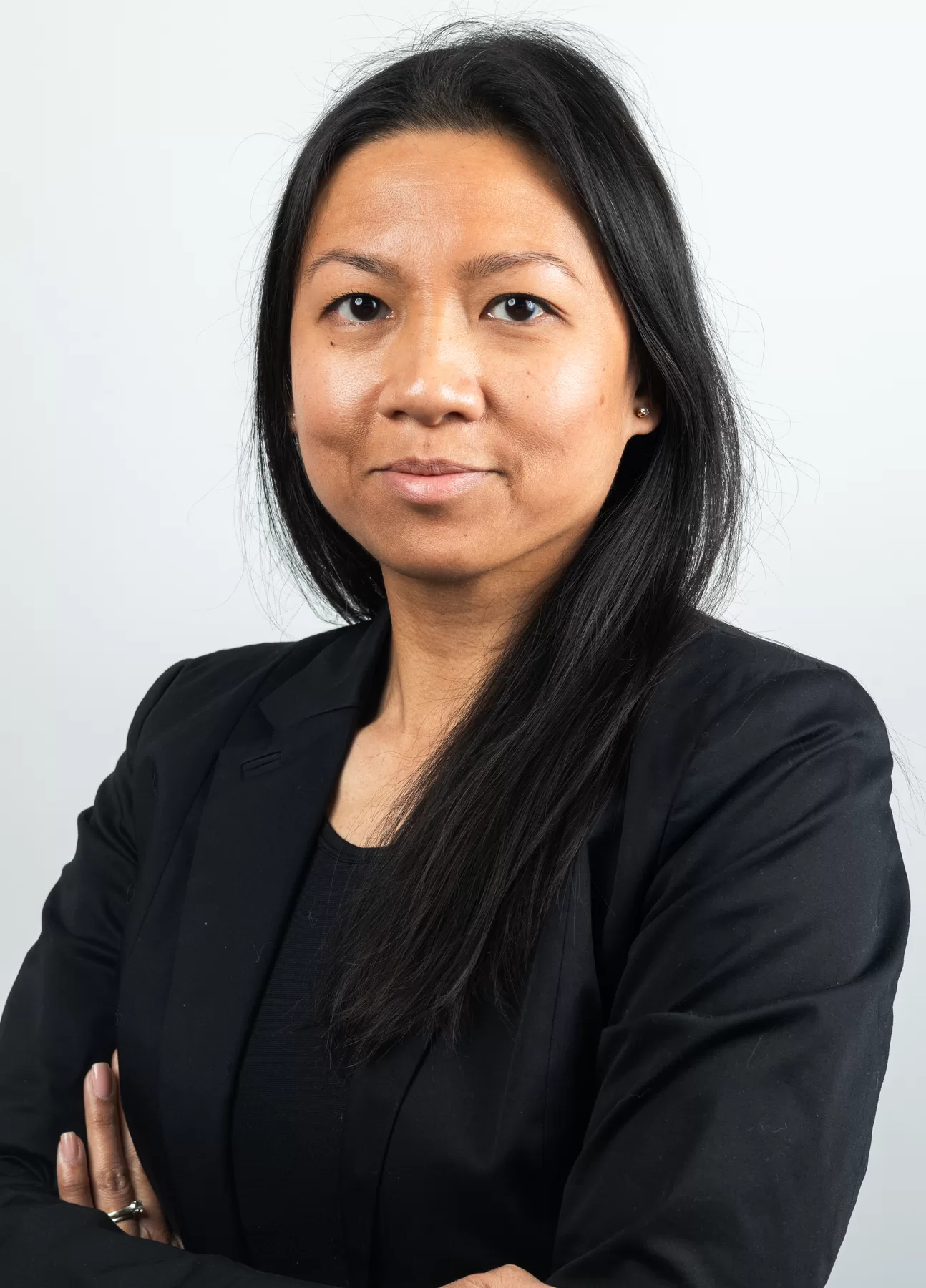 Professional female headshot in a black blazer