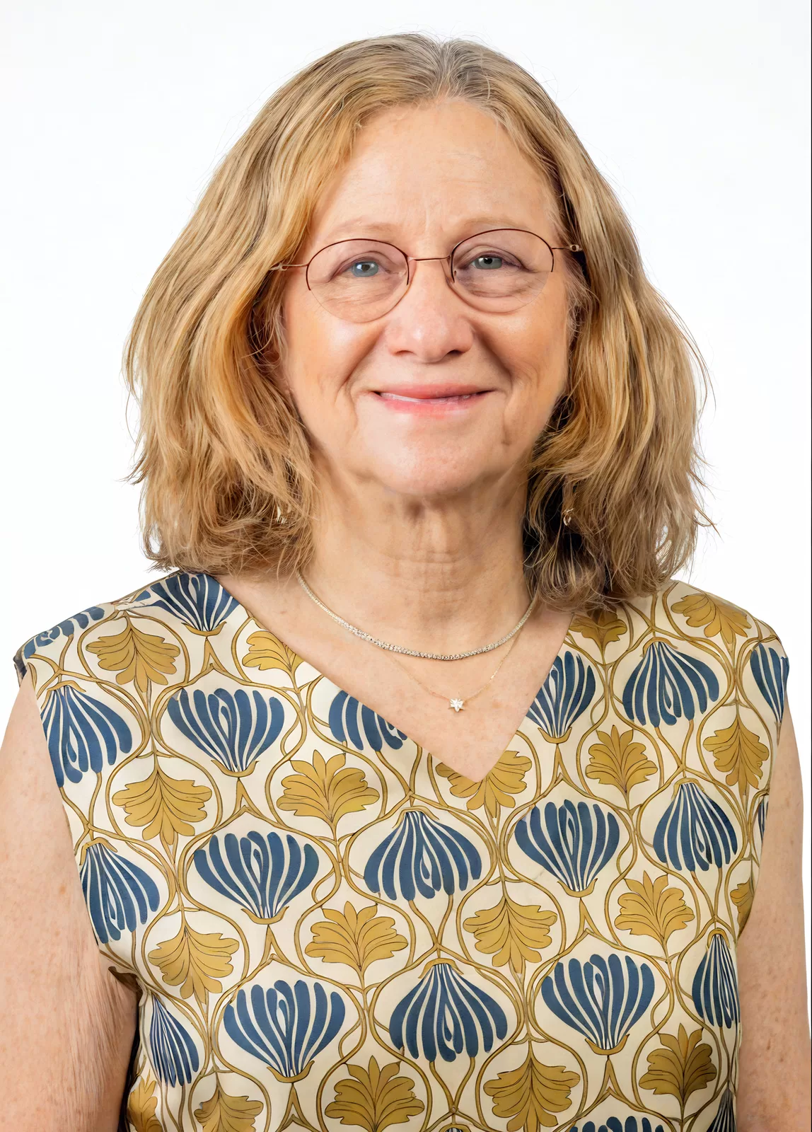 Professional female studio headshot on a white background
