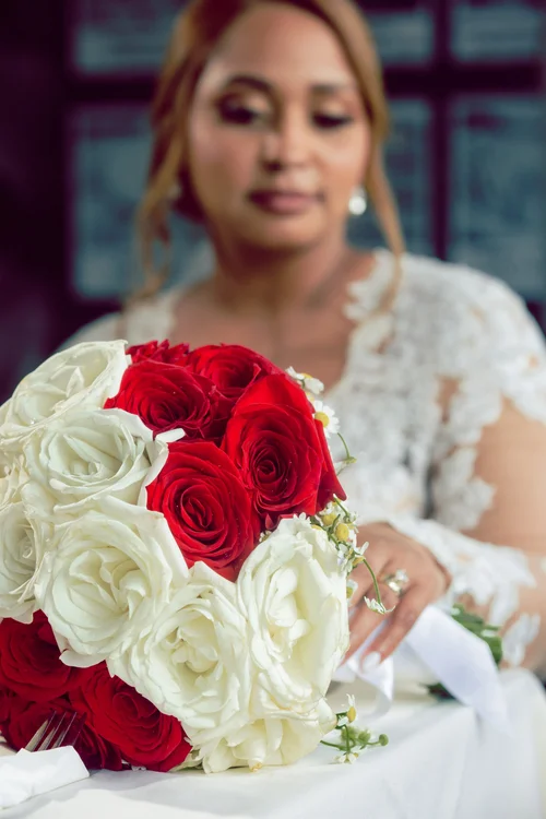 Bride reflected in a mirror while getting ready